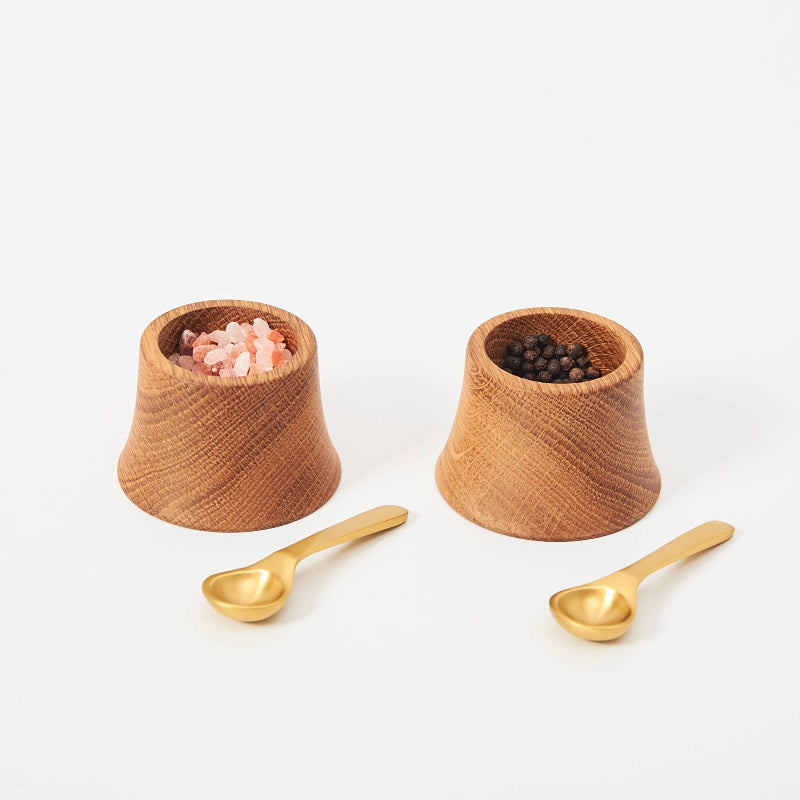 Oak Pinch Bowls with Spoons on a linen table cloth with an oak mortat and marble pestle.
