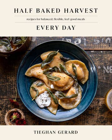 Book cover of 'Every Day' by Tieghan Gerard featuring a dish with ravioli and herbs on a wooden table.