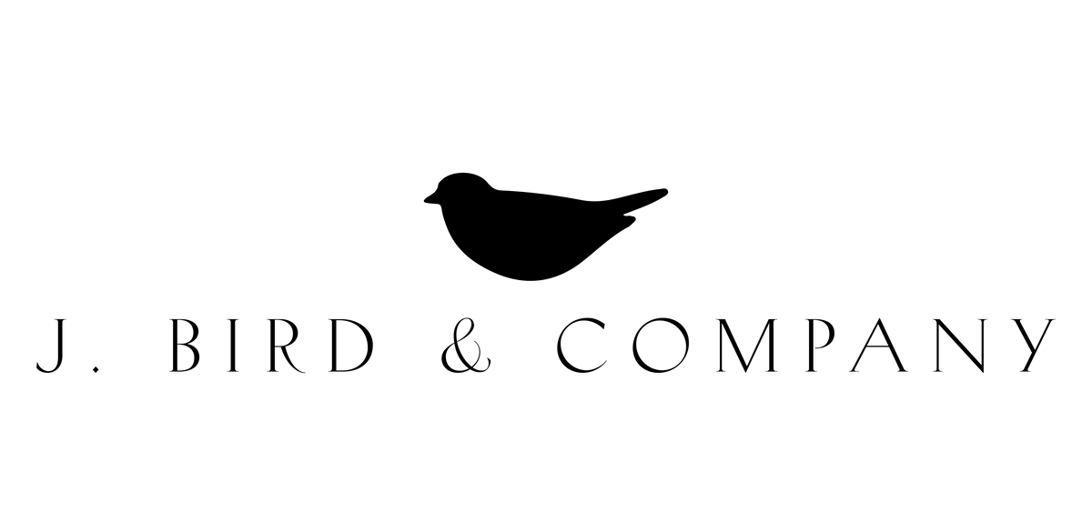 Logo of J. Bird & Company with a stylized bird silhouette on a white background